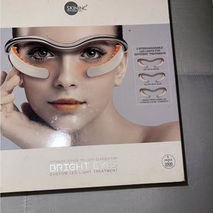 Skin Inc ark circle and wrinkle treatment with three settings .